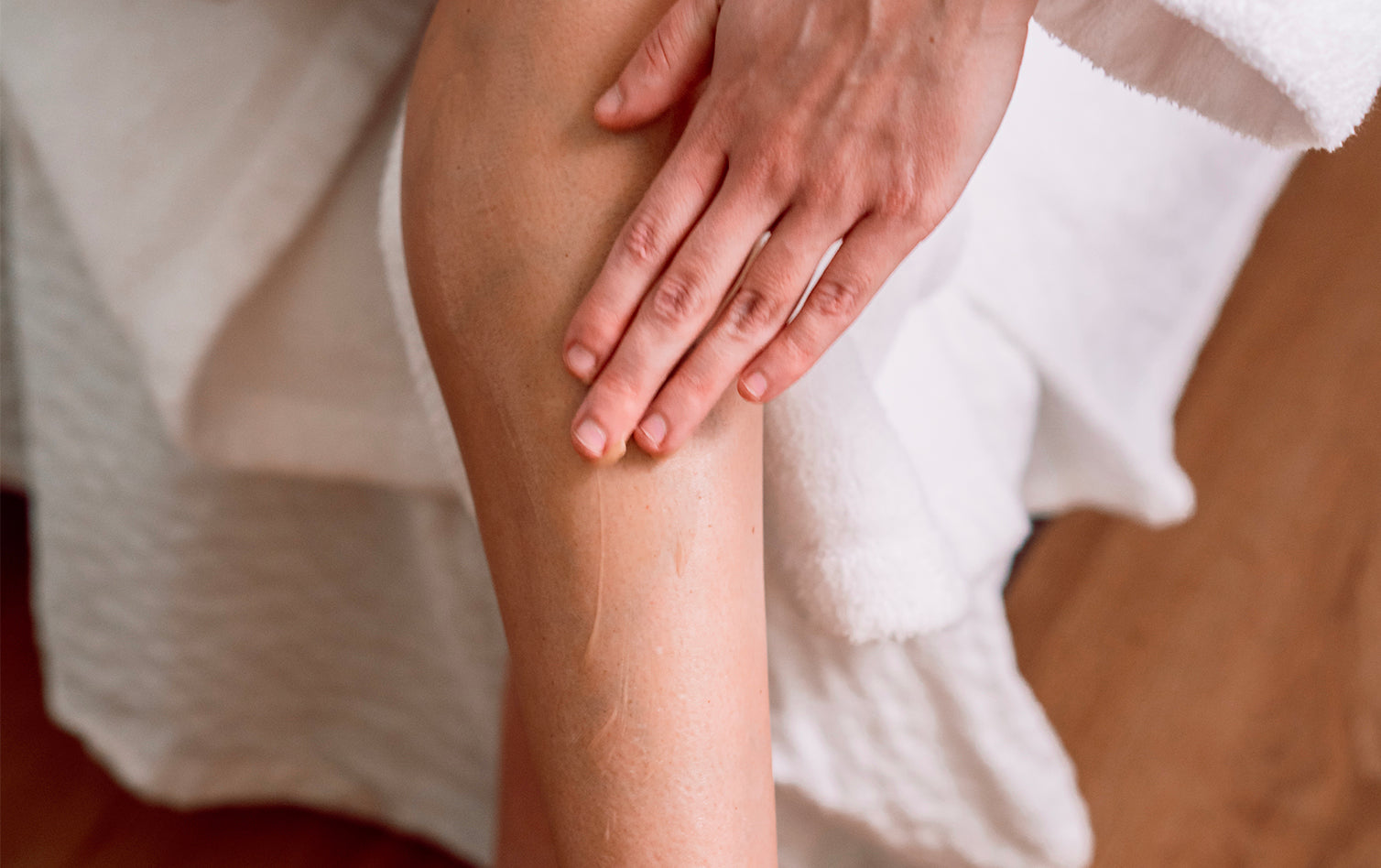 Woman rubbing relief gel onto her skin